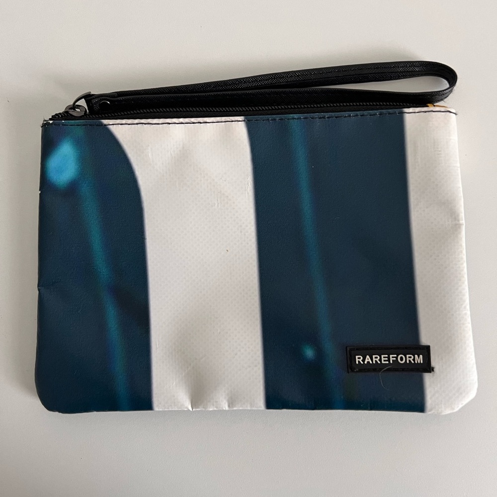 RAREFORM CLARKE CLUTCH ACCESSORY POUCH RE-PURPOSED RECYCLED BILLBOARDS